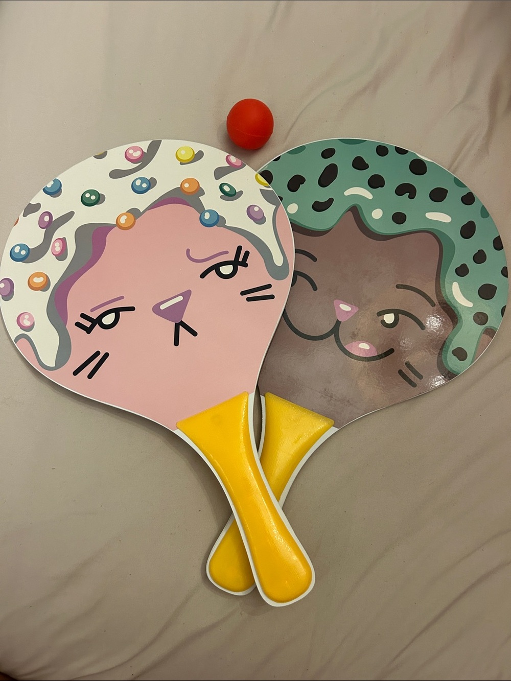 New Paddle ball Set Yellow Handles, Pink & Teal Faces